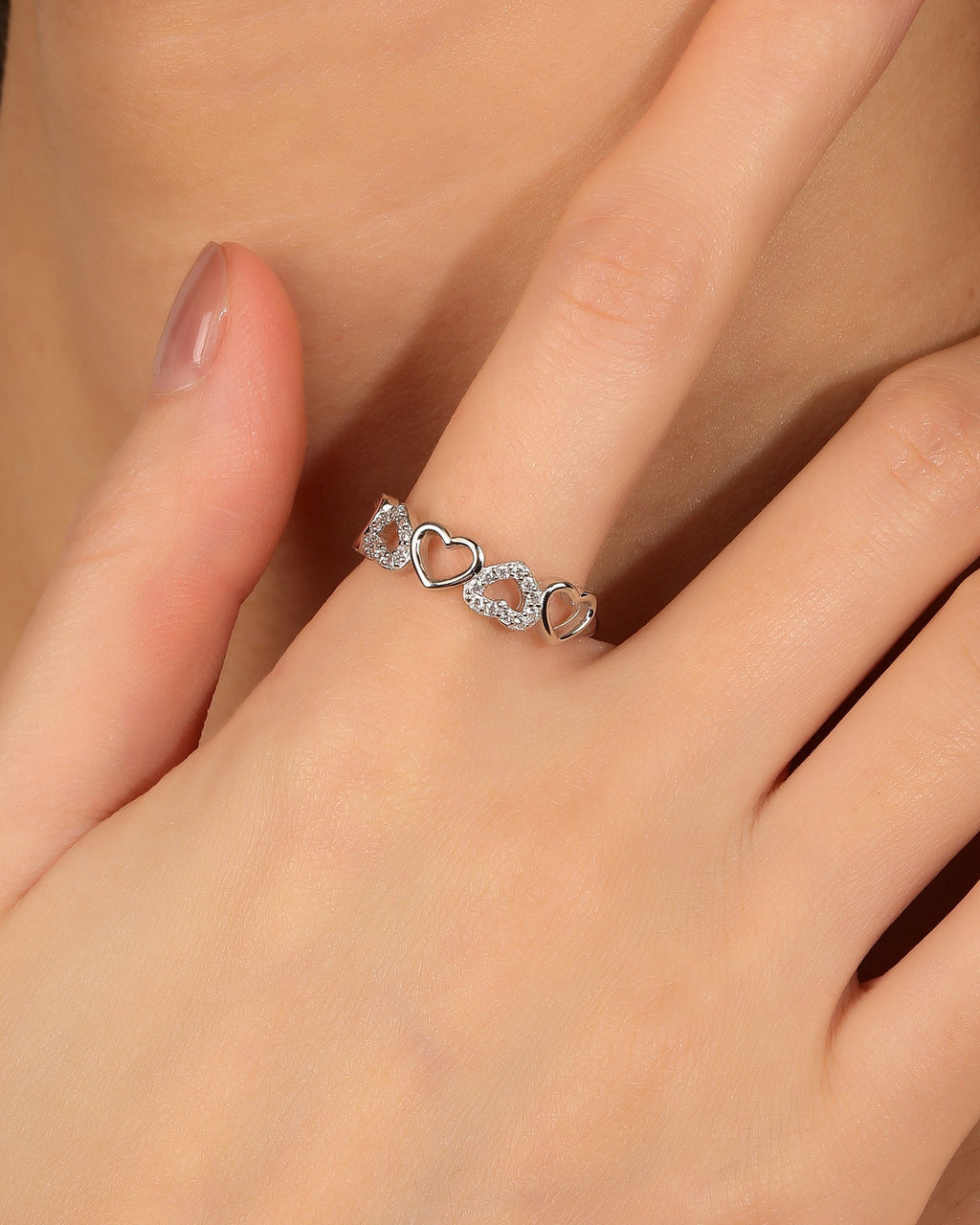 Anillo ajustable de corazones con circonia blanco en rodizado
