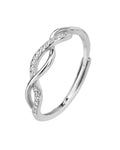 Anillo ajustable con curvas entrelazadas con circonia en rodizado