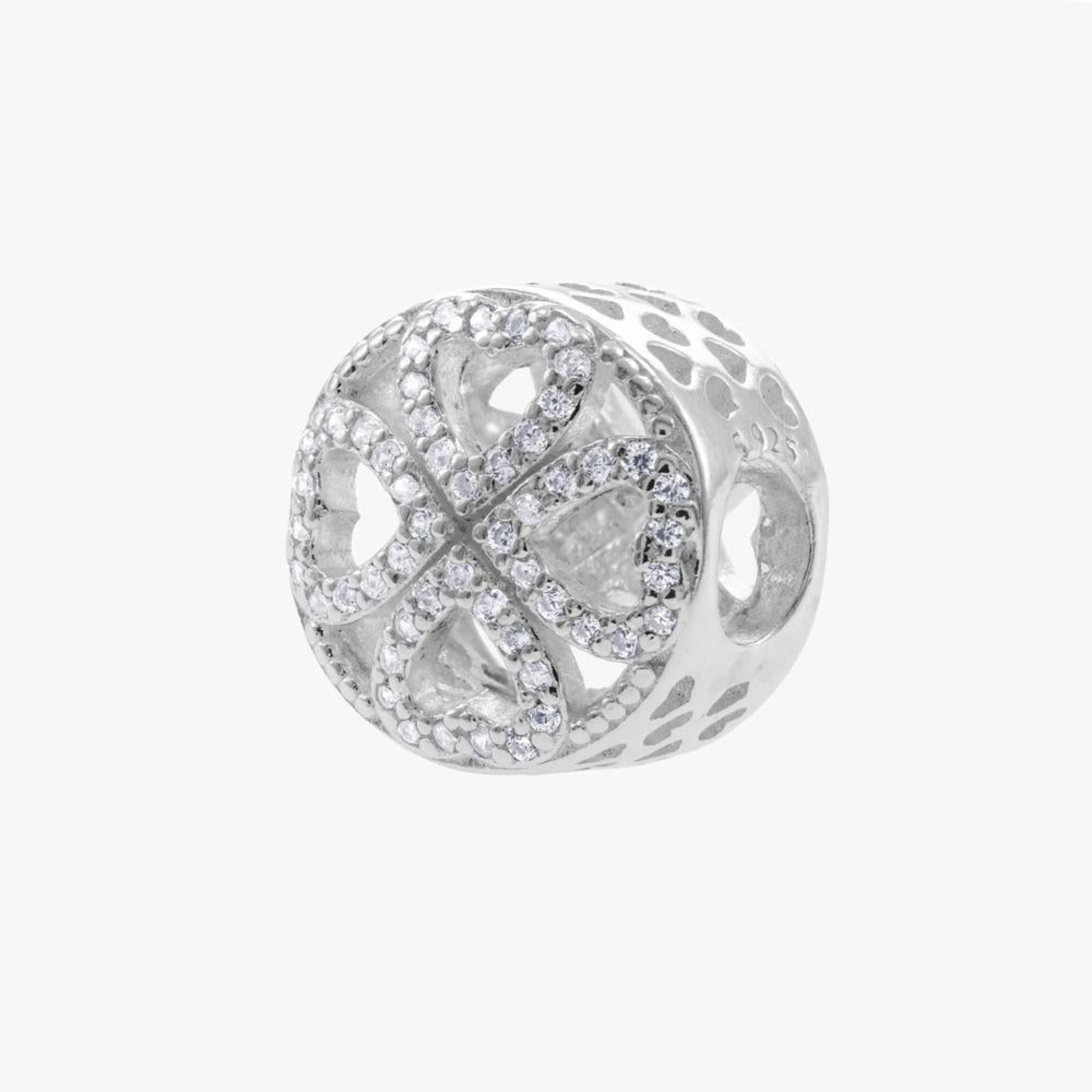 Charm separador de trebol con circonia blanca en plateado