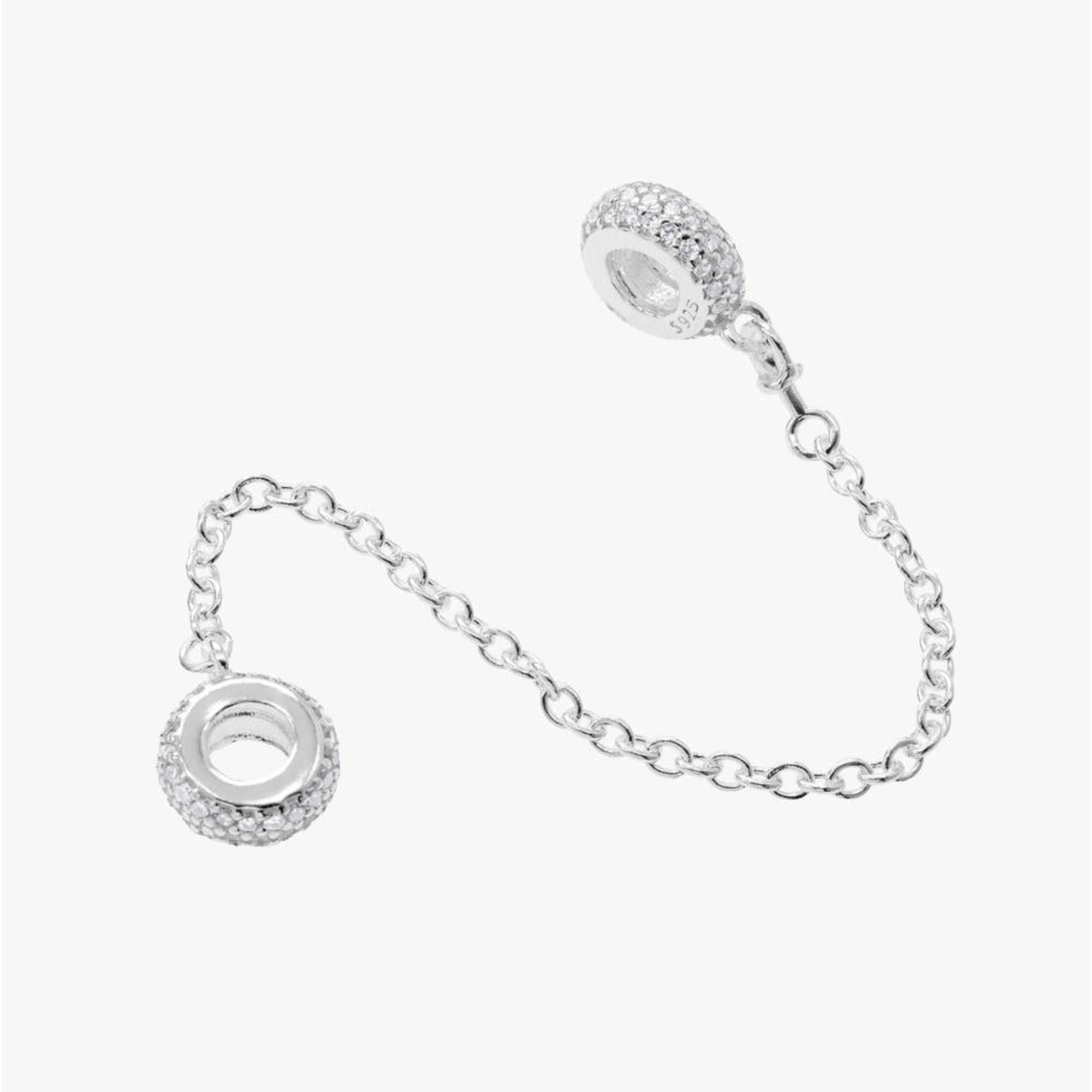 Charm cadena de seguridad de dona con circonia blanca en plateado