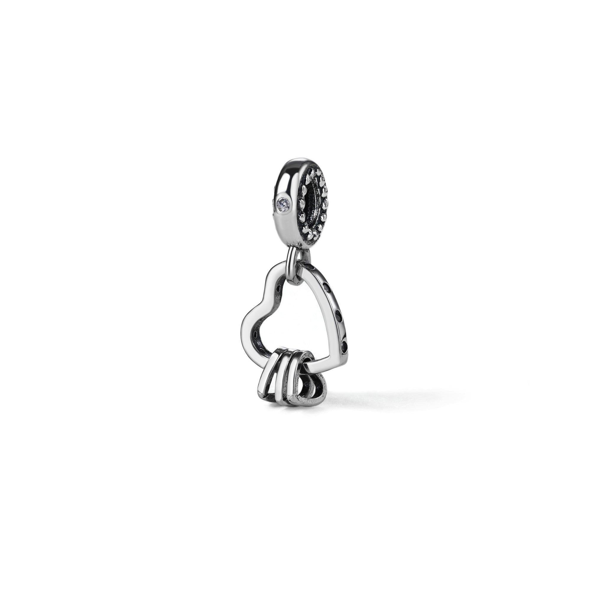 Charm colgante de corazones con circonia blanca en oxidada
