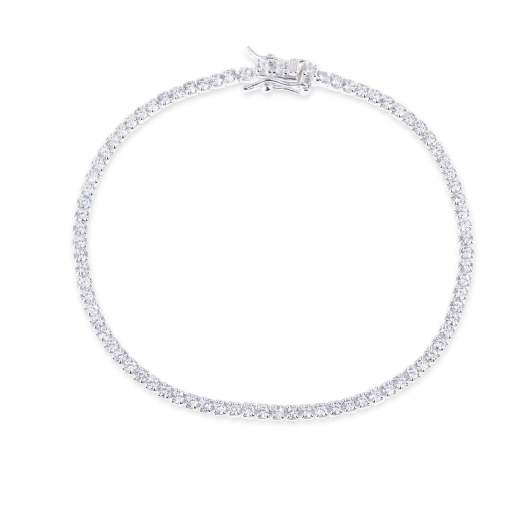 Pulsera tenis con circonia redonda blanca 18cm en plateado