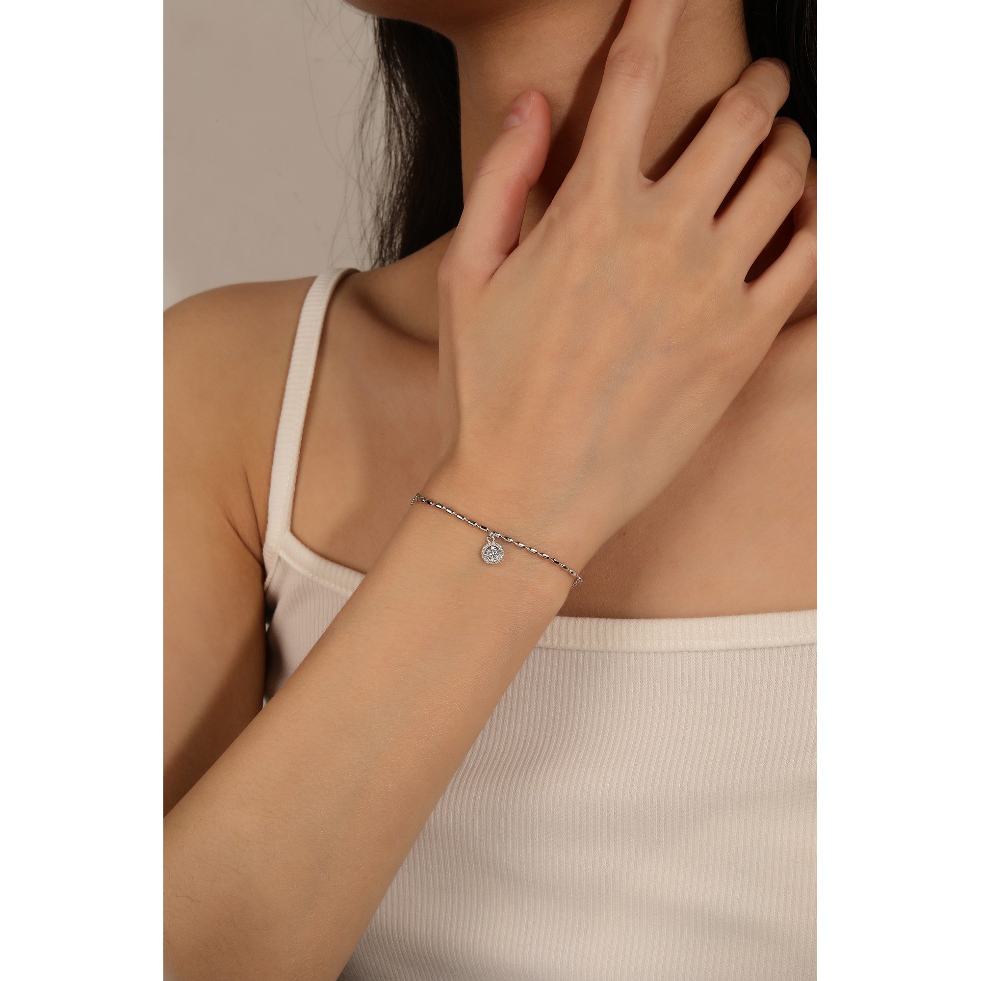 Pulsera mixta con eslabon arroz y esfera de circonias en rodizado