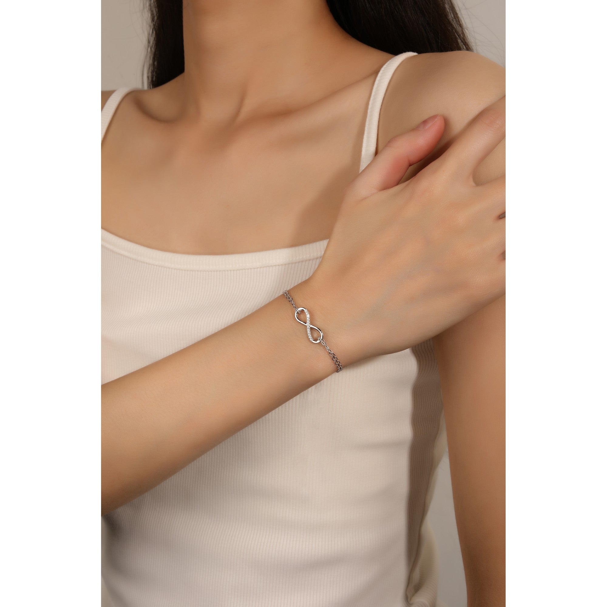 Pulsera doble de infinito con circonia blanca en rodizado